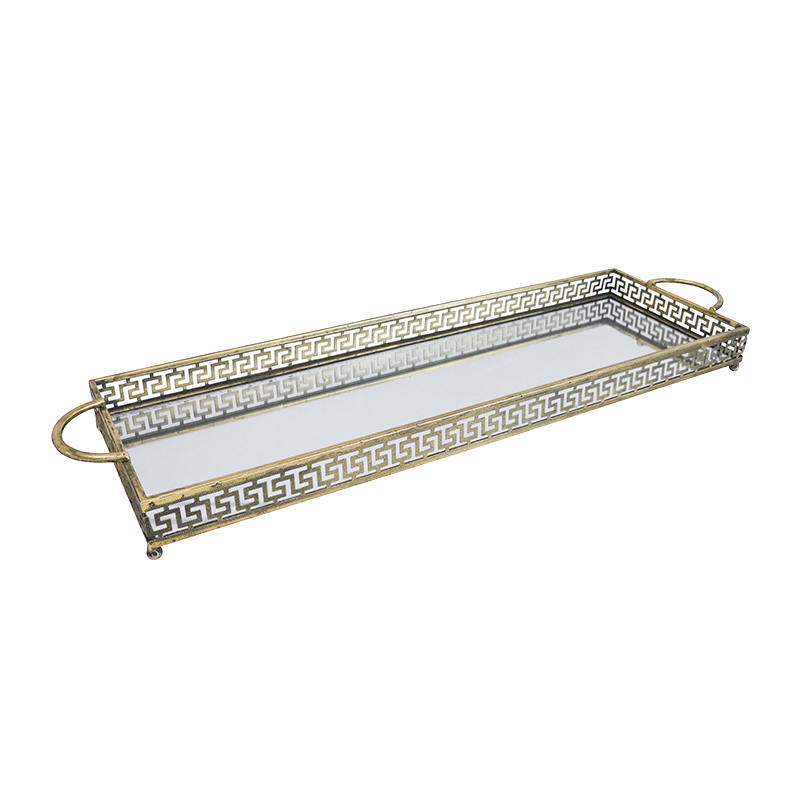 Decorative tray with Greek key design on a white background