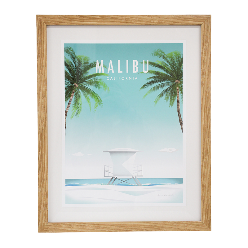 Framed artwork of Malibu, California with palm trees and a beach scene.
