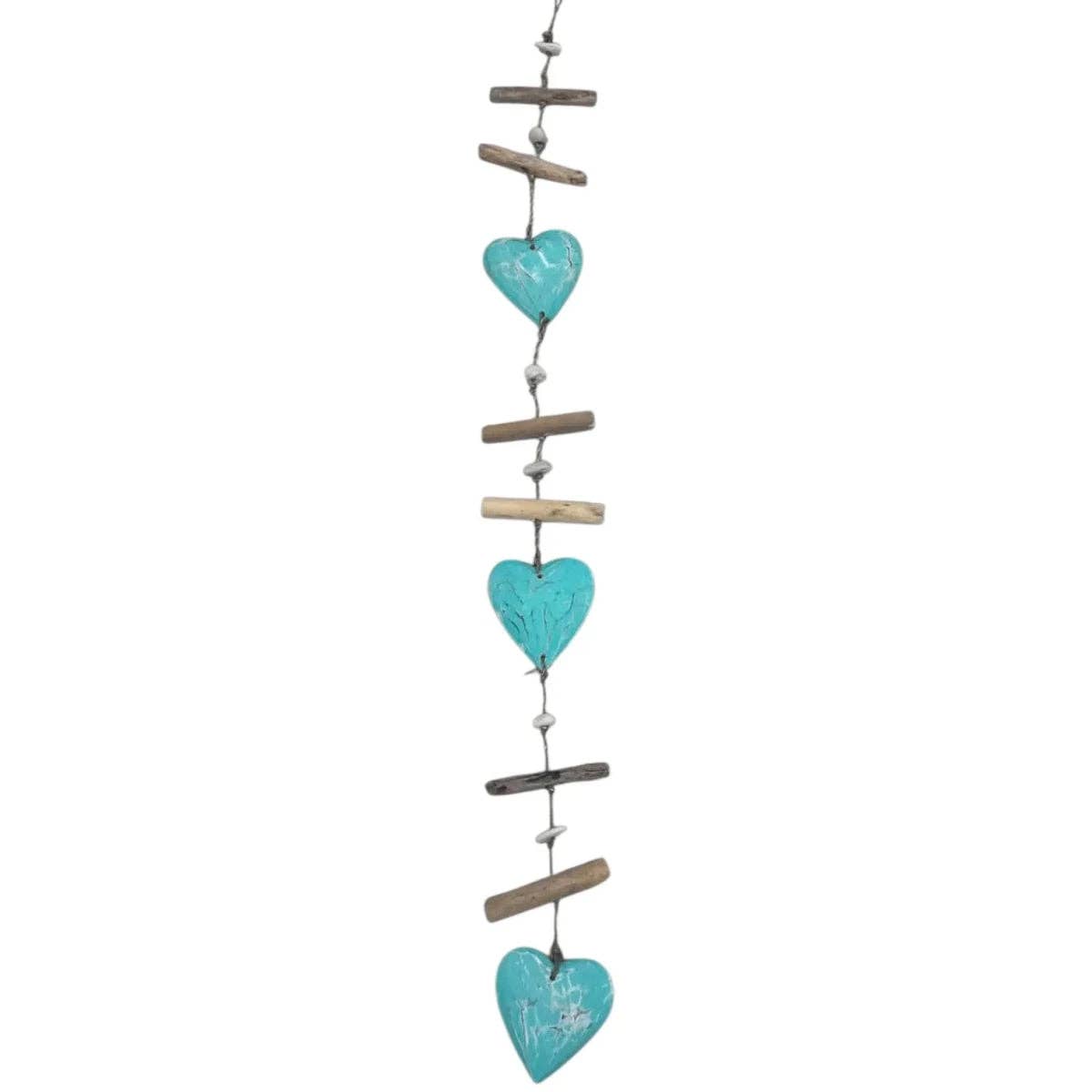 A vertical hanging decorative garland featuring four distressed turquoise heart-shaped beads or pendants suspended between small natural wood and dark metal cross-shaped pieces on a white background.