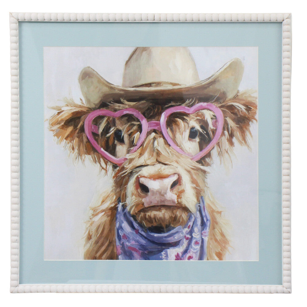 Constance the Cow framed artwork with a cowboy hat, pink heart-shaped glasses and blue scarf.