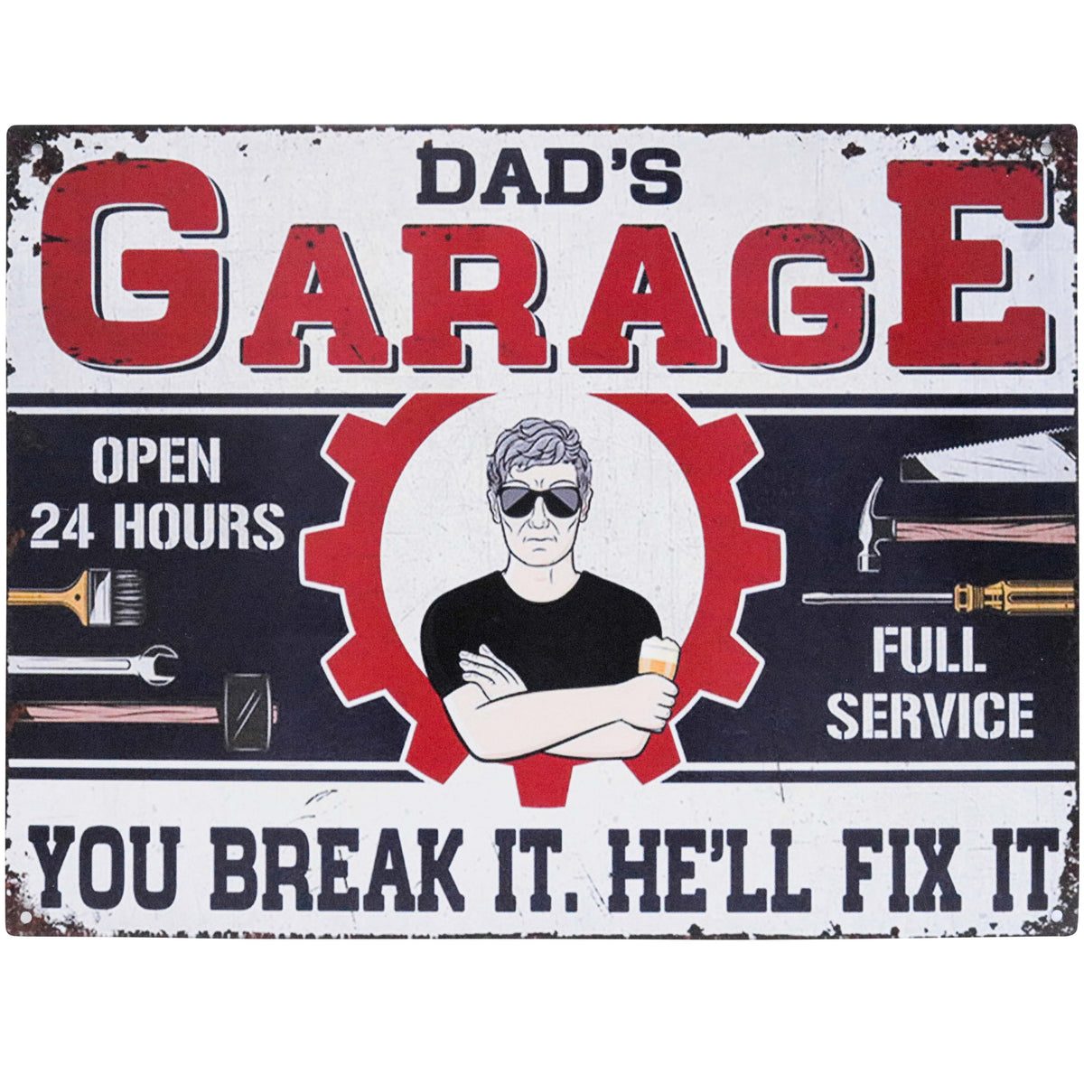 Vintage-style Dad’s Garage metal sign with red, black and cream graphics, tool illustrations and “You break it. He’ll fix it!” wording.
