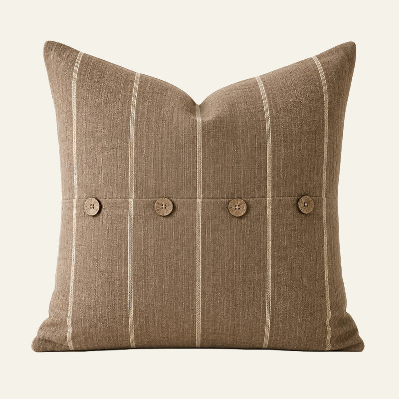 Square cocoa brown French linen cushion cover with fine natural stripes and four coconut buttons.