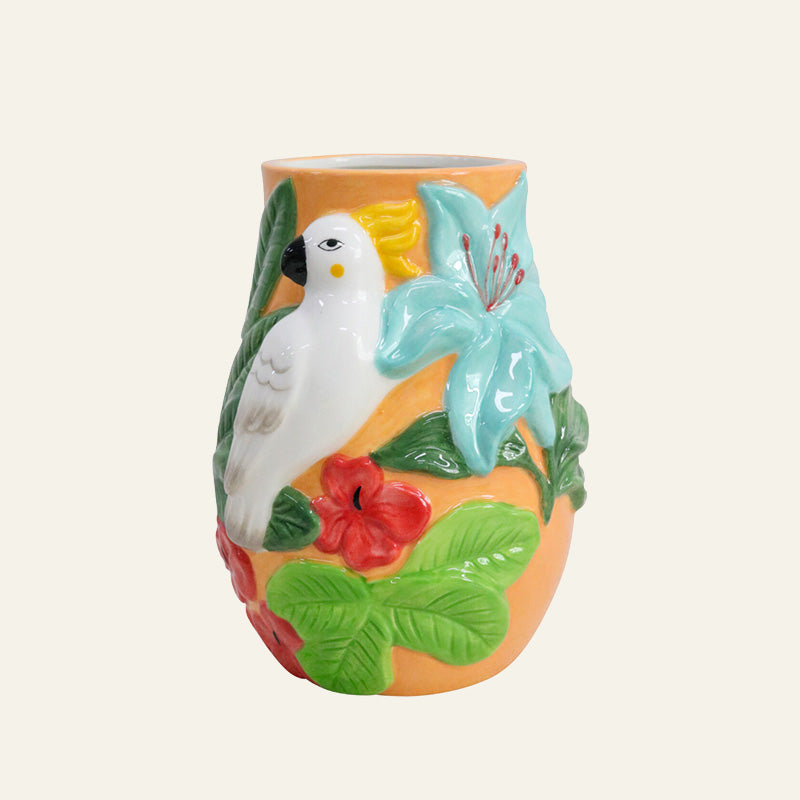 1. Hand-painted orange ceramic vase with a raised white cockatoo, green tropical leaves and red hibiscus flowers.