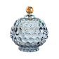 Decorative glass jar with a textured surface and gold lid 