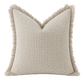 Natural organic waffle cushion cover with textured weave and frayed edge detail