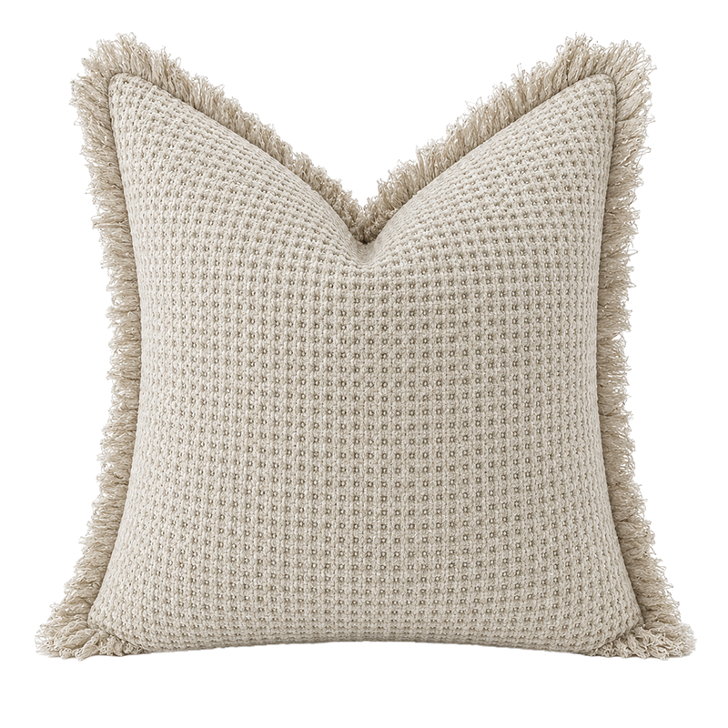 Natural organic waffle cushion cover with textured weave and frayed edge detail