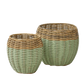 set of woven natural and sage green rattan baskets in two sizes