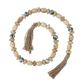 Natural wood and ceramic bead garland with tassel detailing