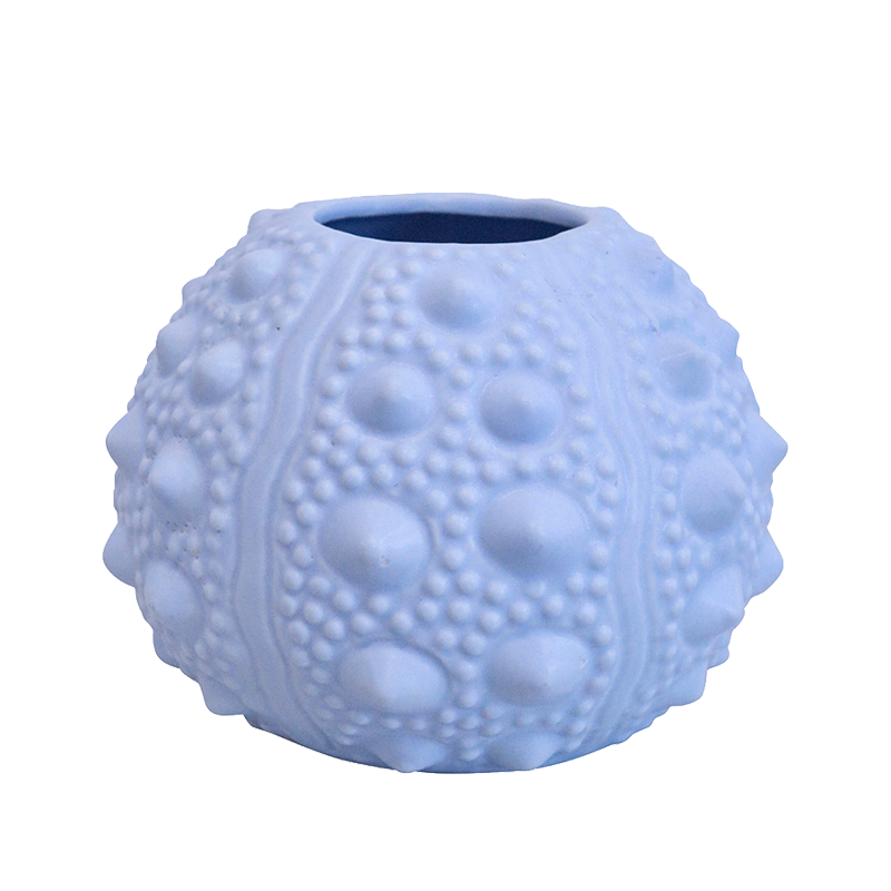 pale blue vase with sea urchin texture