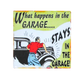 Vintage-style coaster with a cartoon of a man by a car and text 'What happens in the garage.