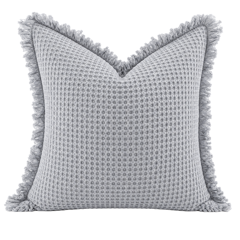 Organic cotton waffle cushion cover in light grey with textured weave and frayed edge detail
