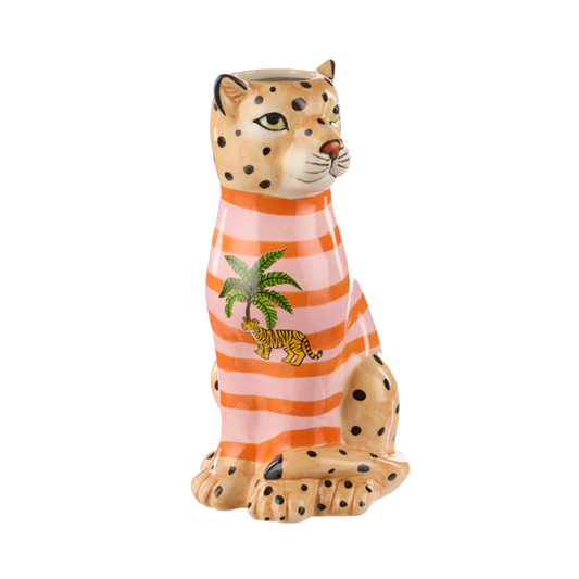 Ceramic leopard figurine wearing an pink and red striped shirt with a palm tree and tiger design 