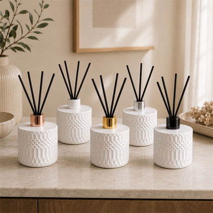 Collection of textured white diffusers with various lid colour options 