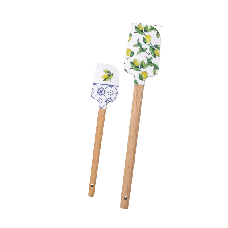 Set of two silicone kitchen spatulas with lemon designs and natural timber handles.