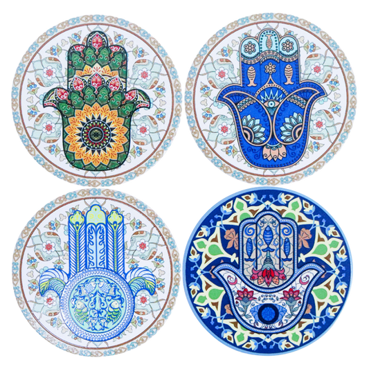 Set of four ceramic coasters featuring colourful decorative Hamsa hand designs with intricate patterns.
