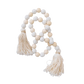 Decorative string of white stone and pink wooden beads with tassels o