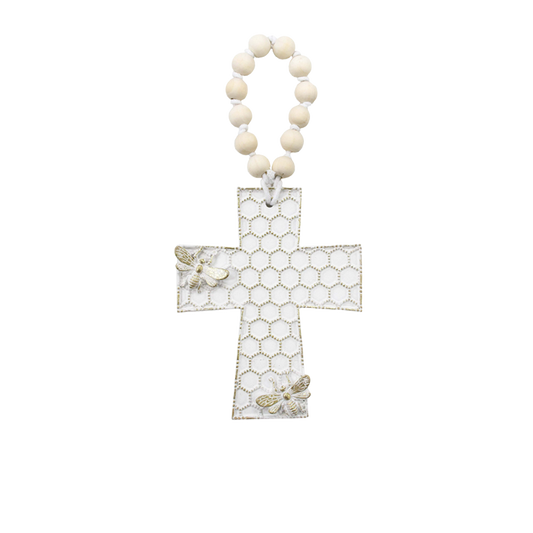 Decorative honeycomb cross ornament with bee detailing and hanging loop