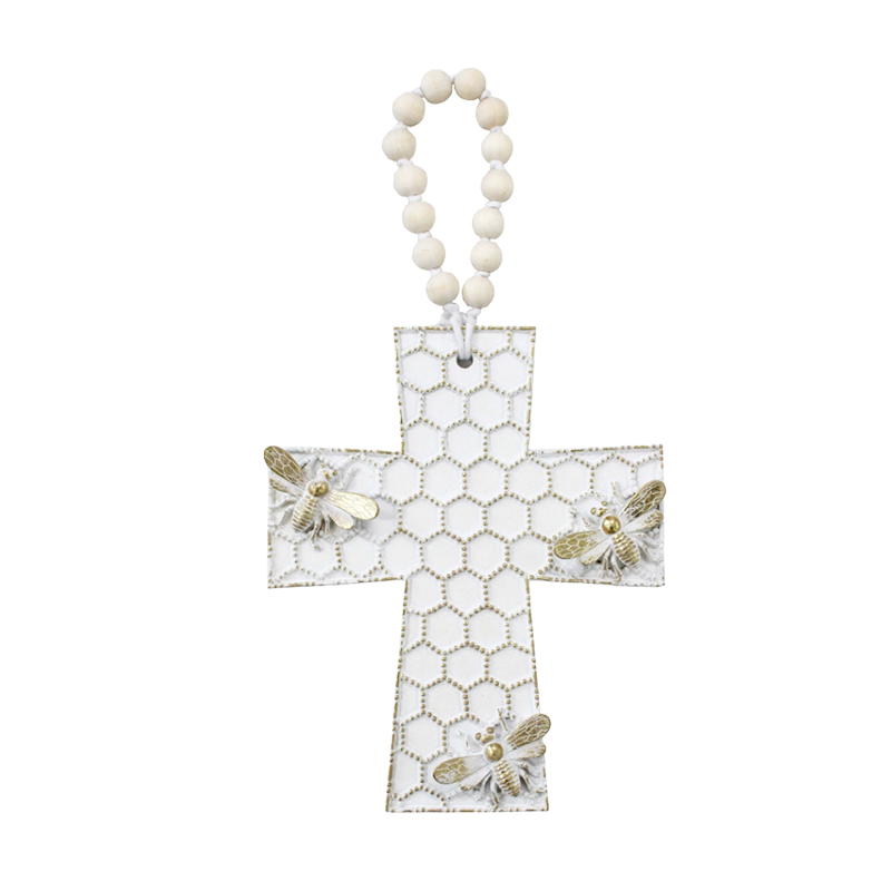 Decorative honeycomb cross ornament with bee detailing and hanging loop