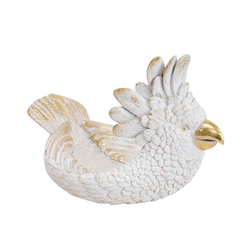 White and gold cockatoo trinket bowl with detailed feather texture and decorative resin finish