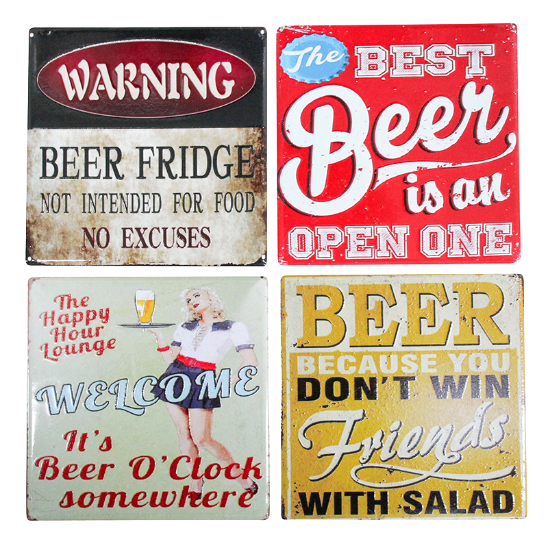 Four vintage-style beer-themed metal signs with humorous sayings.