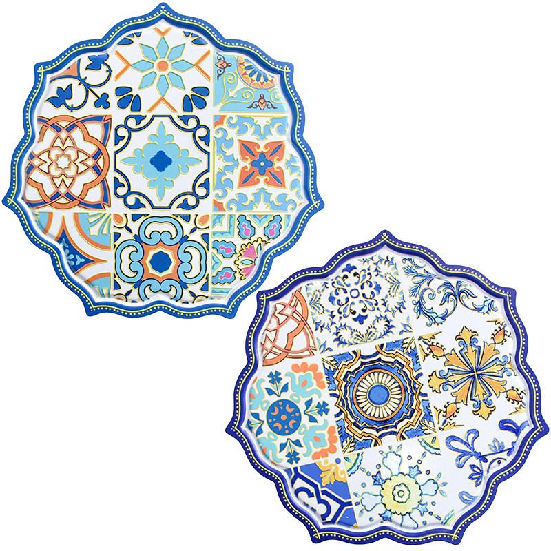 Two decorated trivets with intricate moroccan influenced patterns 