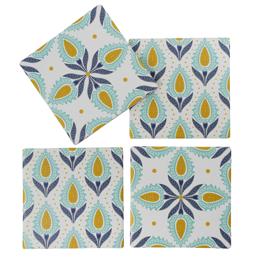Set of four coasters with a floral pattern on a white background