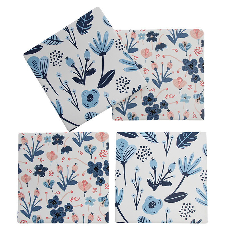 Set of floral-patterned coasters on a white background