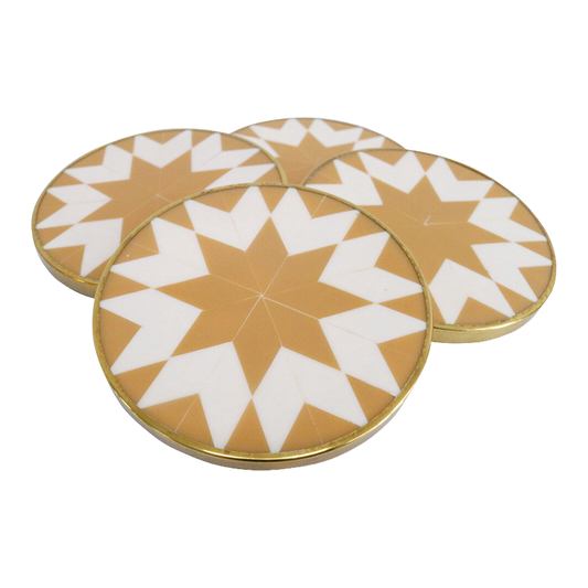 Set of four round coasters with a tan geometric pattern on a white background