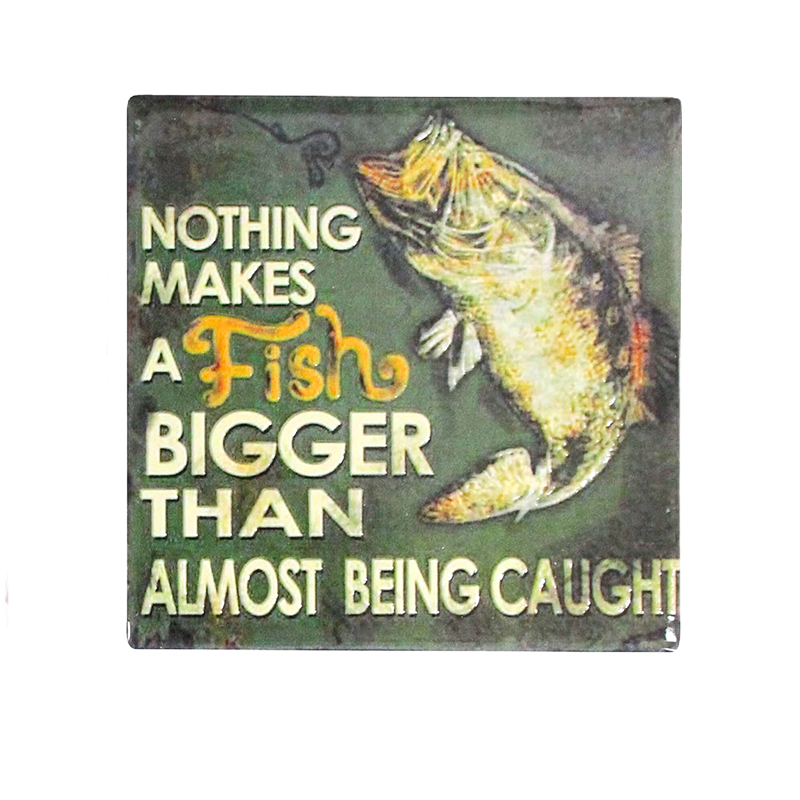 Coaster with a fish illustration and text saying nothing makes fish bigger than almost being caught