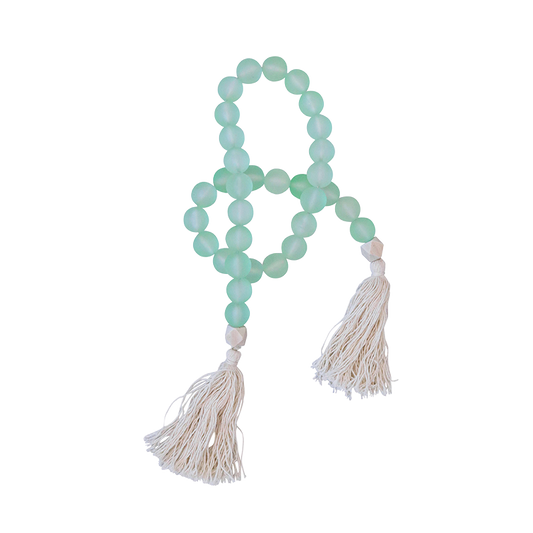 Garland with mint green beads and white tassels 