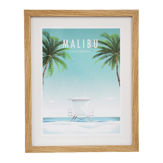 Framed artwork of Malibu, California with palm trees and a beach scene.