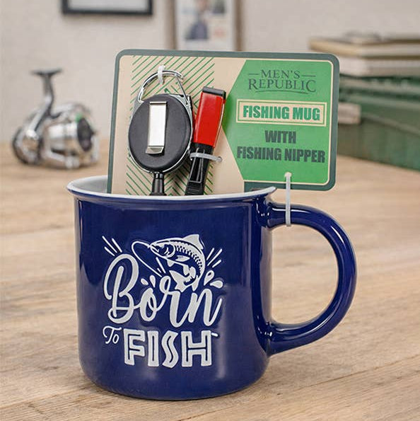 Blue mug with 'Born to Fish' text and fishing nipper on a wooden surface