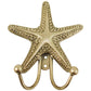 Antique-gold textured starfish wall hook with two curved hooks.