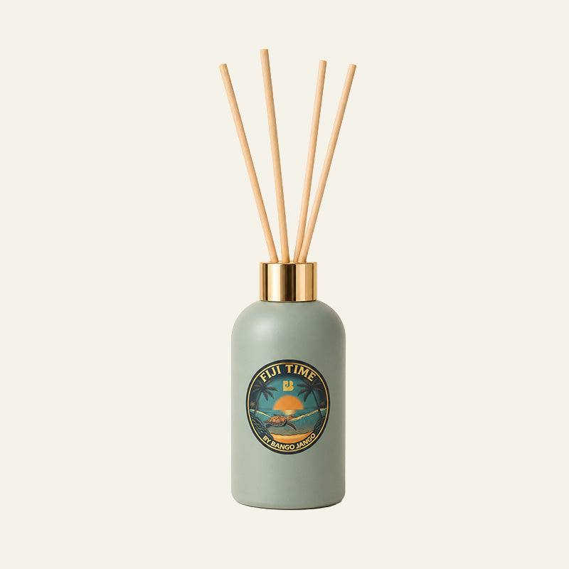 Green diffuser bottle with wooden sticks 