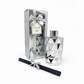 Luxury diffuser set with geometric design, packaging, and black sticks on a white background