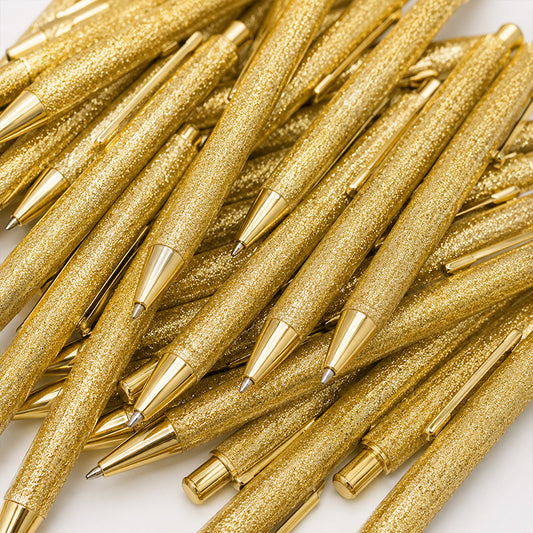 A pile of Gold Glitter Ballpoint Pens