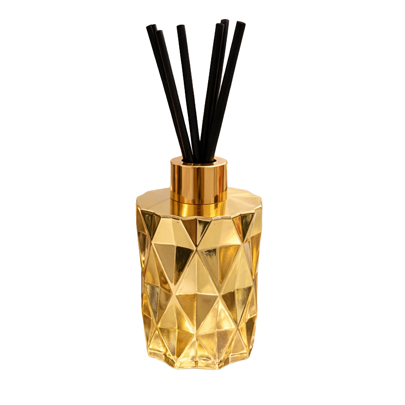 Gold geometric diffuser with black reeds 