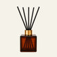 amber glass Kairo diffuser bottle with black reed  sticks