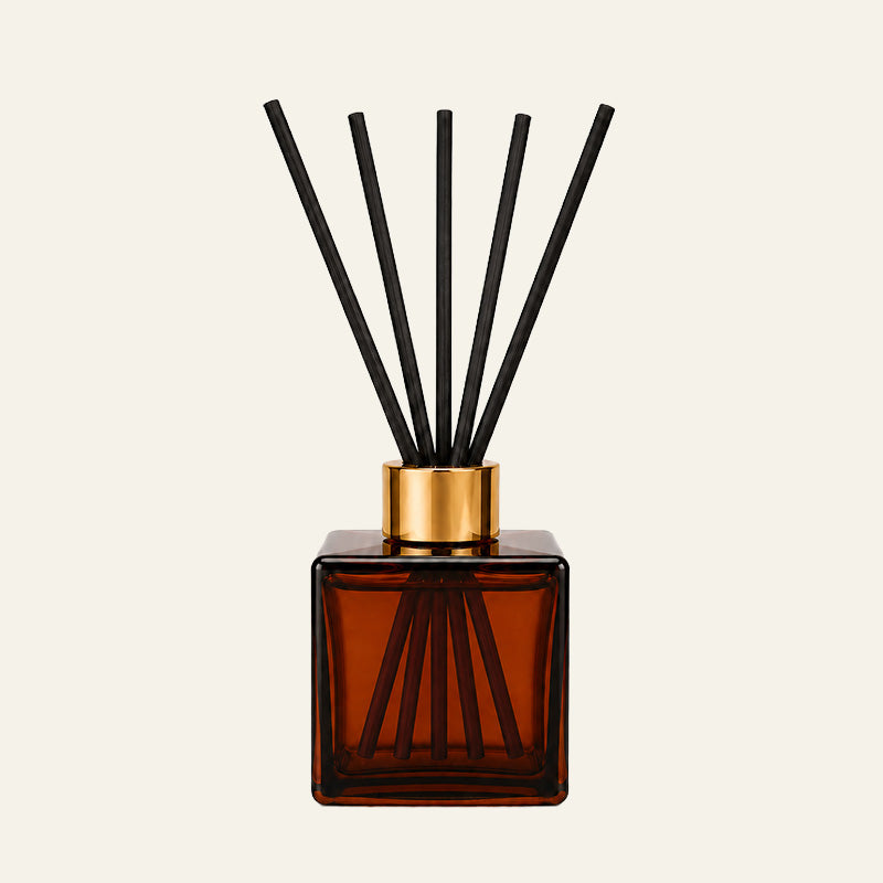 amber glass Kairo diffuser bottle with black reed  sticks