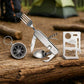 A stainless steel multi-tool pocket knife set displayed on a log in a forest setting, featuring a fork, corkscrew, spoon, and a card tool holder.