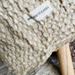 Close-up of the natural waffle weave and vintage-style lace border