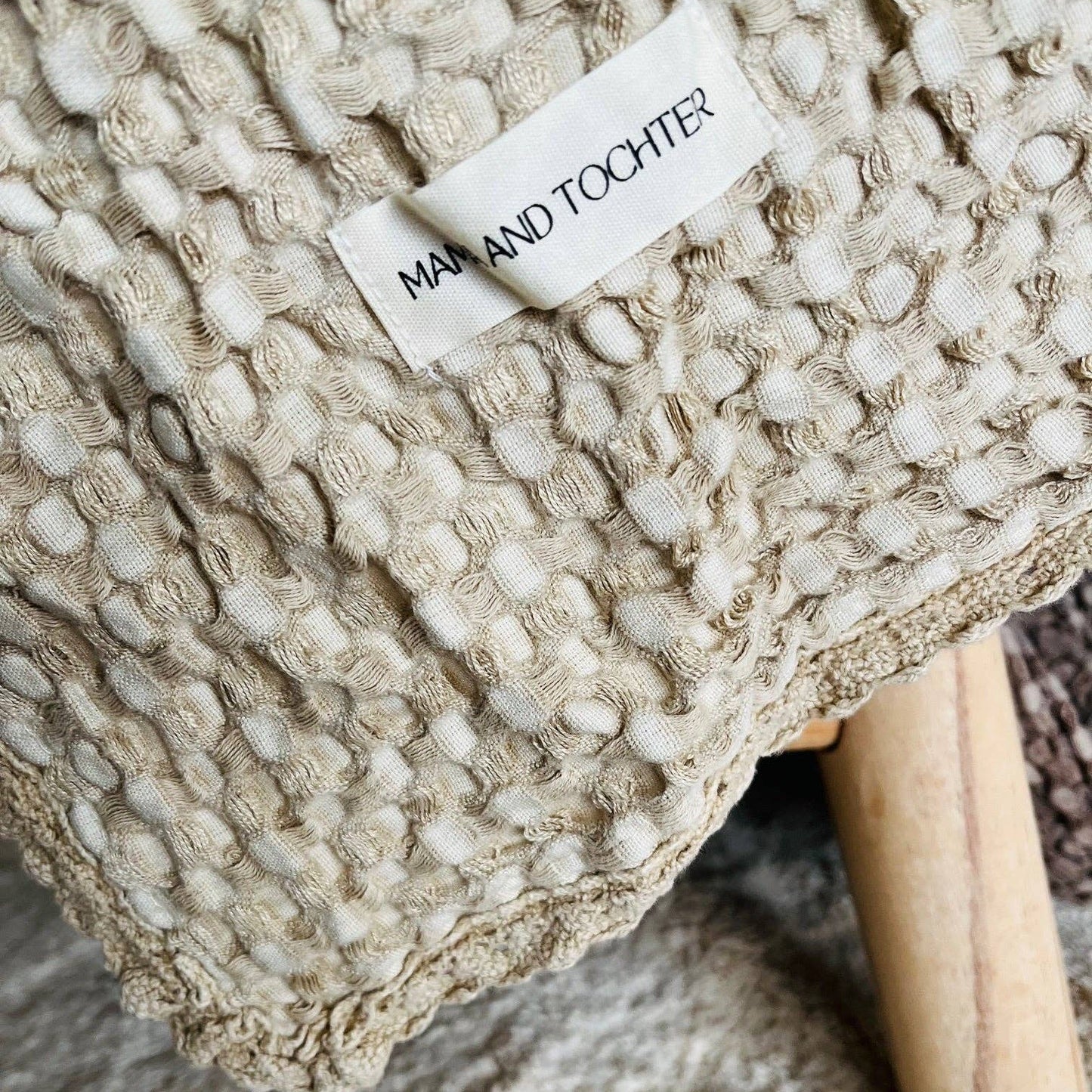 Close-up of the natural waffle weave and vintage-style lace border