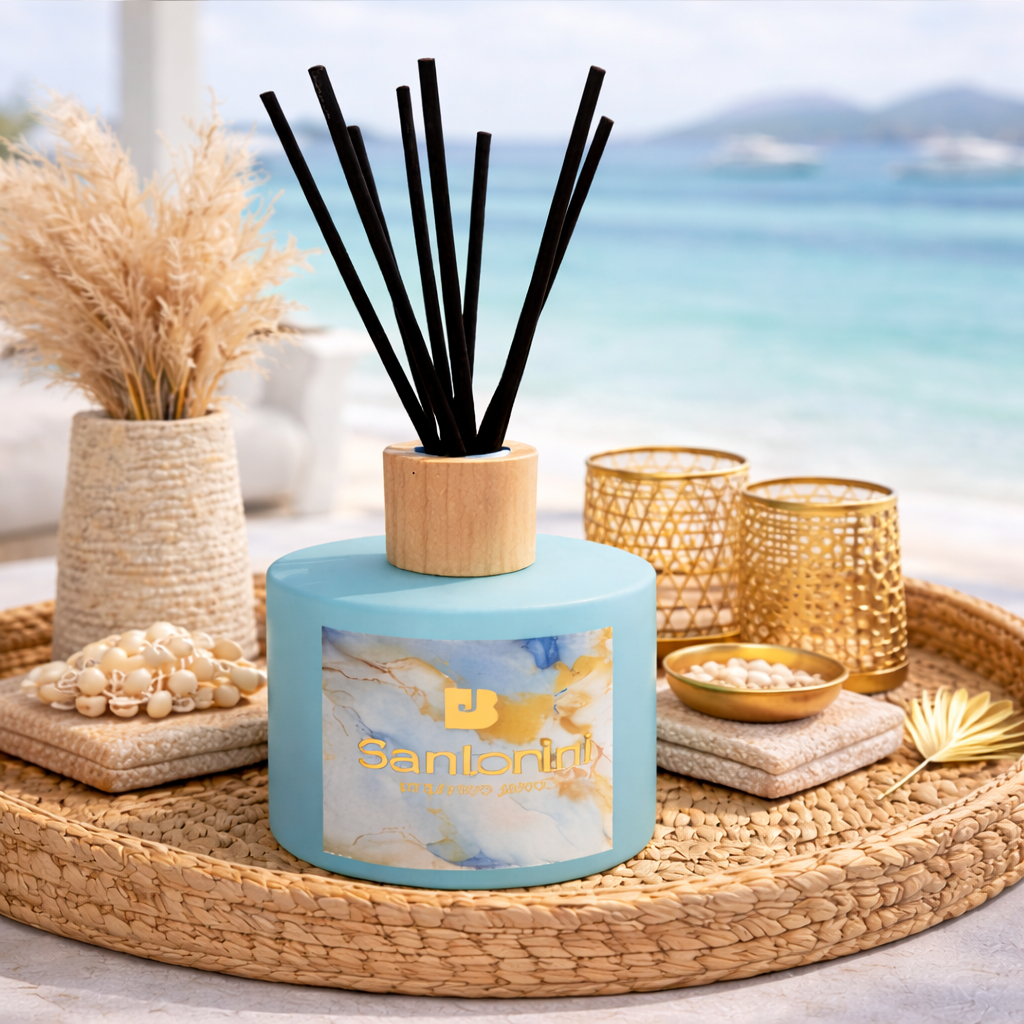 Reed diffuser with a beach-themed design on a woven tray with decorative items.