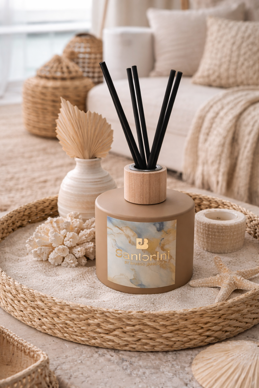 Decorative diffuser with black sticks on a woven tray in a cozy living room setting.