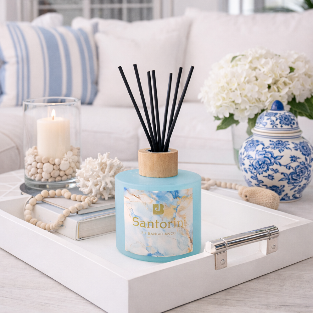 Santorini diffuser on a coffee table with decorative items