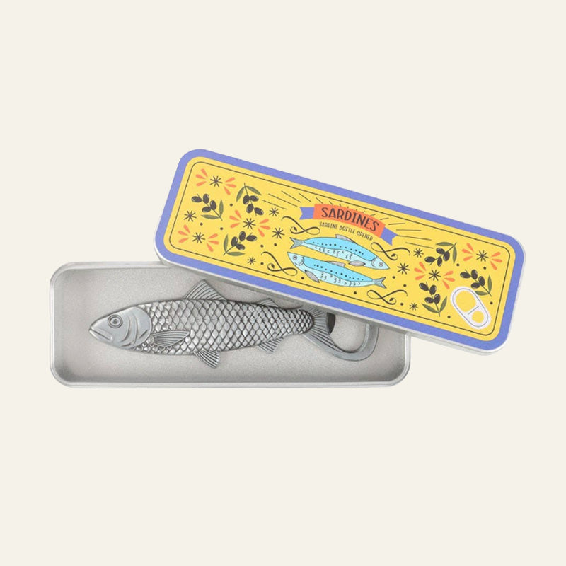 Sardine bottle opener in Sardine tin storage container
