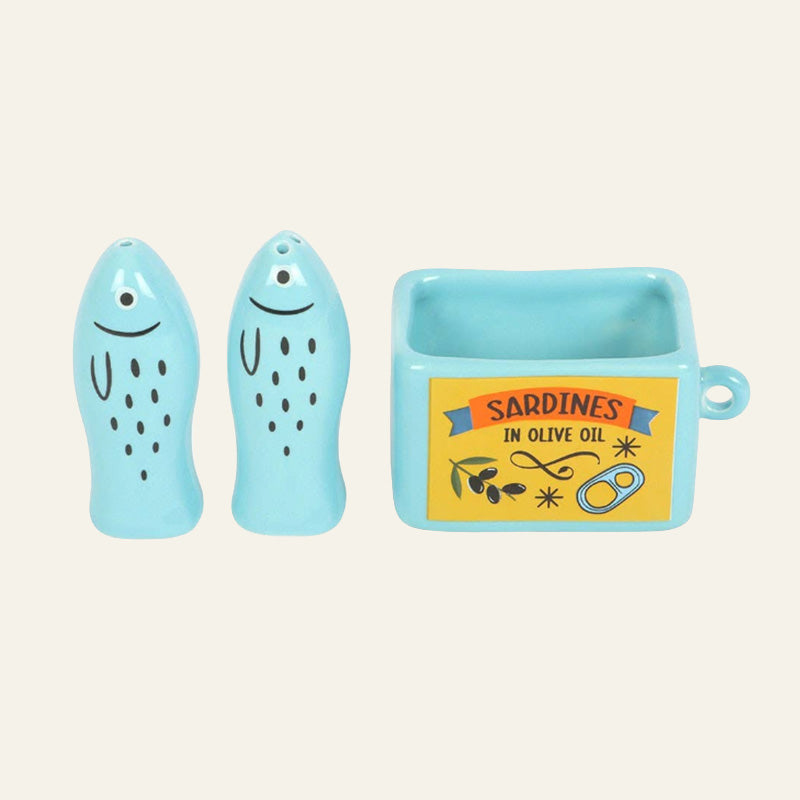Set of blue sardine-shaped salt and pepper shakers with a rectangular box labeled 'Sardines in Olive Oil' 