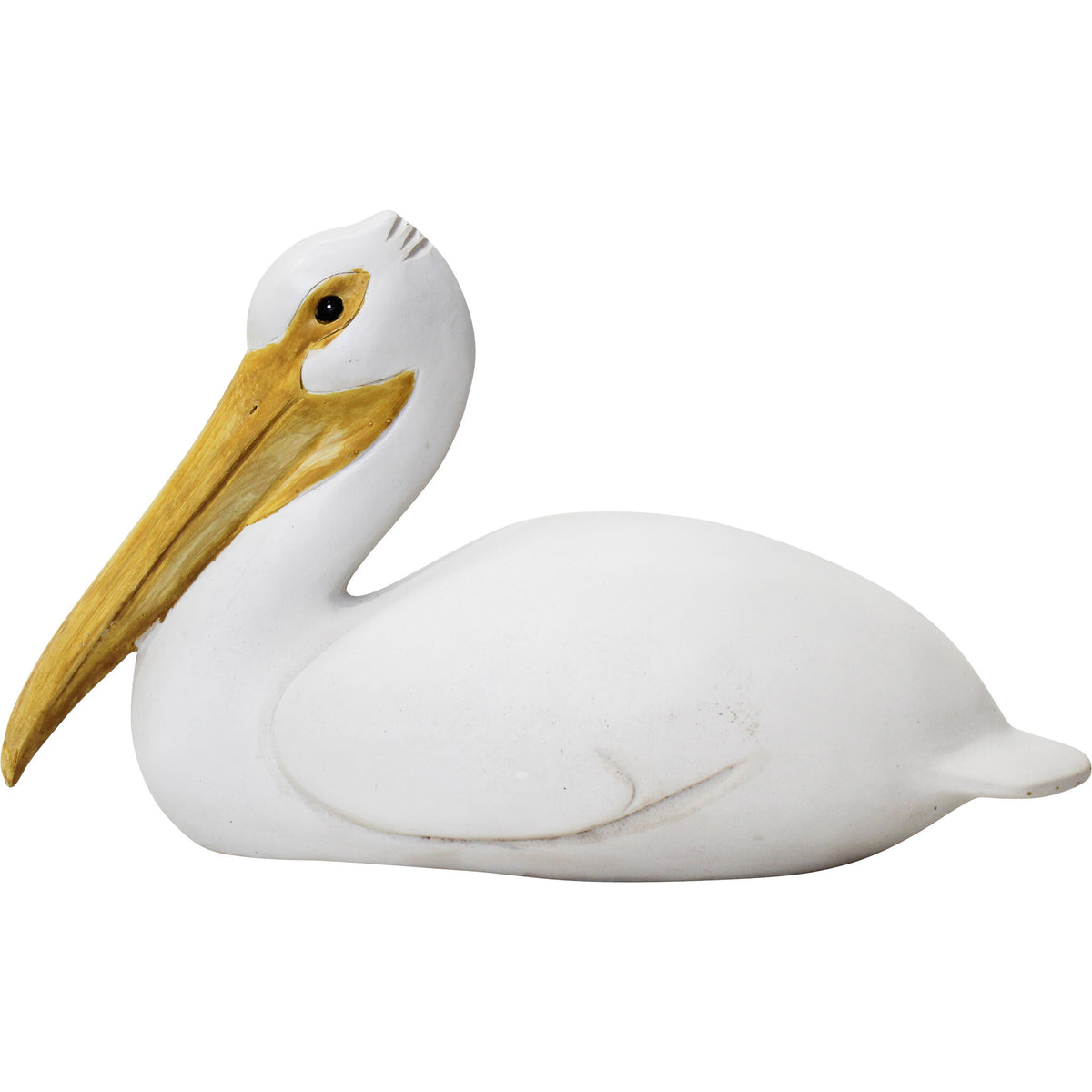 White seated pelican decoration with an ochre-coloured beak.