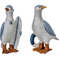 Pair of vintage-style coastal seagulls with a surfboard, goggles and life ring.