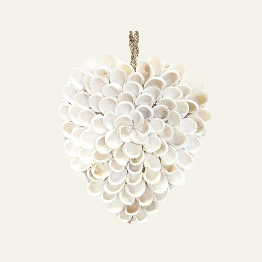 Small handmade white shell heart hanging made from layered natural shells with a twine loop at the top.